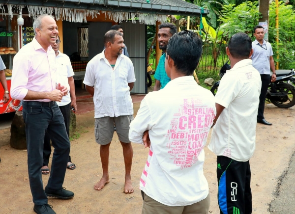 Minister Sagala Ratnayaka observing proceedings in Elpitiya