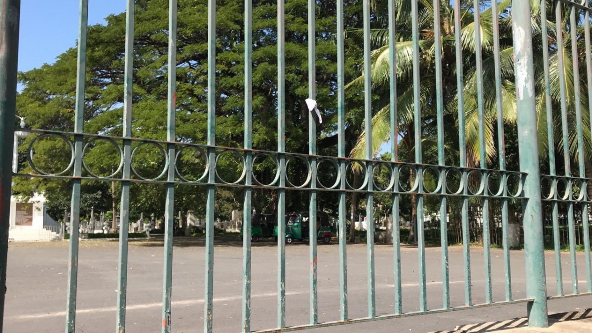 White Handkerchiefs Tied Around The Gate Of Borella Cemetery To Commemorate Forced Cremation Of 20-Day Infant Removed Overnight