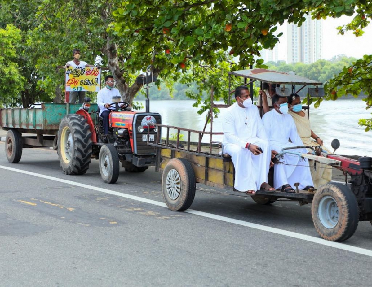 Opposition Conducts Vehicle Procession With Trucks, Tuk Tuks And Bikes Against Fuel Price Increase