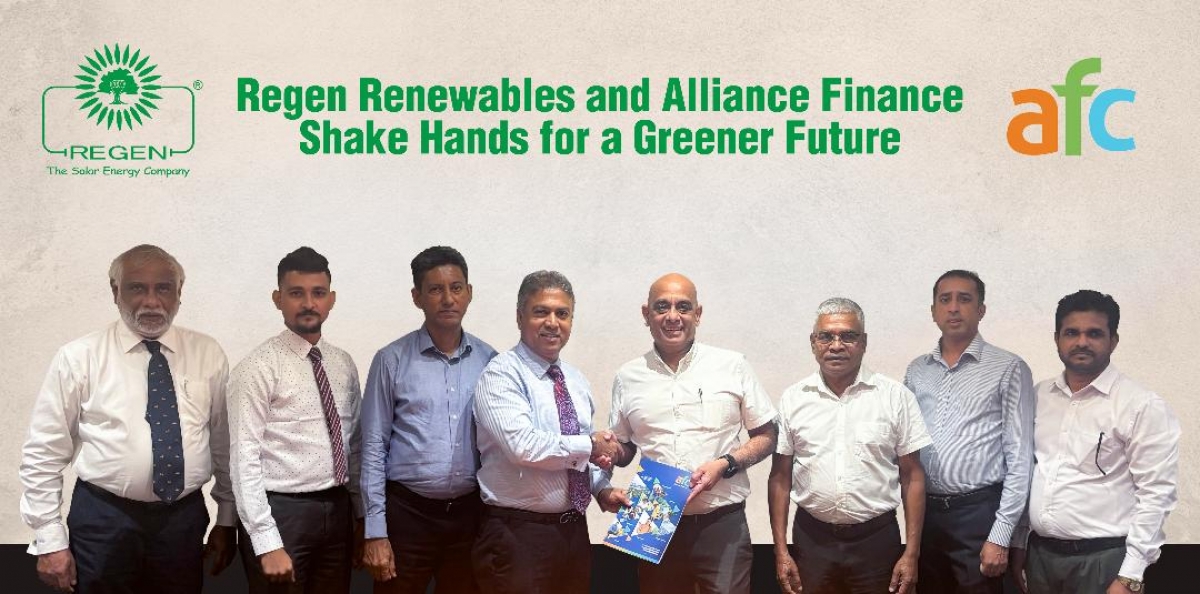 Dr. Lakmal Fernando, Managing Director/CEO of Regen Solar, with Romani De Silva, Deputy Chairman and Managing Director of Alliance Finance Company PLC, at the signing.